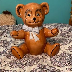 Ceramic piggy bank with blue bow tie